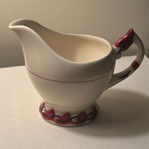 Small Hand painted Vernon Kilns cream colored ceramic creamer with handle
